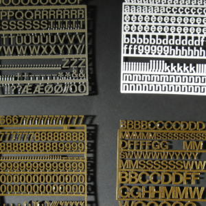 Silver and Gold Characters - Variatex Groove Letterboard